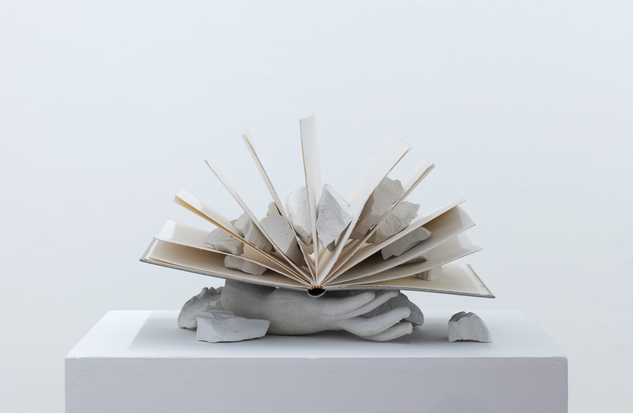 Giulio Paolini, L'Arte e lo Spazio di Martin Heidegger, 1983, hardcover book, plaster cast, fragments, 31x25,5x36 cm Courtesy of The Schaufler Foundation Photo: Maniscalco